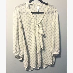 White polka-dot blouse